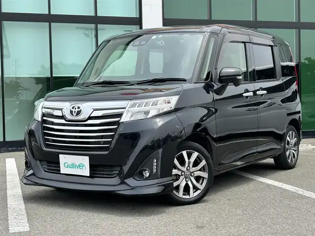 トヨタ ルーミー カスタムG－T 和歌山県 2020(令2)年 2.7万km ブラックマイカメタリック 純正ナビ/フルセグTV/バックカメラ/（BT/CD/DVD)/プリクラッシュセーフティー/クルーズコントロール/コーナーセンサー/横滑り防止装置/両側パワースライドドア/純正フロアマット/純正アルミホイール/アイドリングストップ/シートヒーター/革巻きステアリング/LEDヘッドライト/フォグランプ/オートライト/オートマチックハイビーム