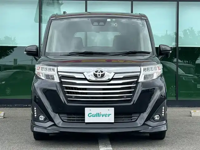 トヨタ ルーミー カスタムG－T 沖縄県 2020(令2)年 2.7万km ブラックマイカメタリック 純正ナビ/フルセグTV/バックカメラ/（BT/CD/DVD)/プリクラッシュセーフティー/クルーズコントロール/コーナーセンサー/横滑り防止装置/両側パワースライドドア/純正フロアマット/純正アルミホイール/アイドリングストップ/シートヒーター/革巻きステアリング/LEDヘッドライト/フォグランプ/オートライト/オートマチックハイビーム