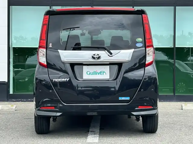 トヨタ ルーミー カスタムG－T 沖縄県 2020(令2)年 2.7万km ブラックマイカメタリック 純正ナビ/フルセグTV/バックカメラ/（BT/CD/DVD)/プリクラッシュセーフティー/クルーズコントロール/コーナーセンサー/横滑り防止装置/両側パワースライドドア/純正フロアマット/純正アルミホイール/アイドリングストップ/シートヒーター/革巻きステアリング/LEDヘッドライト/フォグランプ/オートライト/オートマチックハイビーム