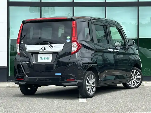 トヨタ ルーミー カスタムG－T 沖縄県 2020(令2)年 2.7万km ブラックマイカメタリック 純正ナビ/フルセグTV/バックカメラ/（BT/CD/DVD)/プリクラッシュセーフティー/クルーズコントロール/コーナーセンサー/横滑り防止装置/両側パワースライドドア/純正フロアマット/純正アルミホイール/アイドリングストップ/シートヒーター/革巻きステアリング/LEDヘッドライト/フォグランプ/オートライト/オートマチックハイビーム