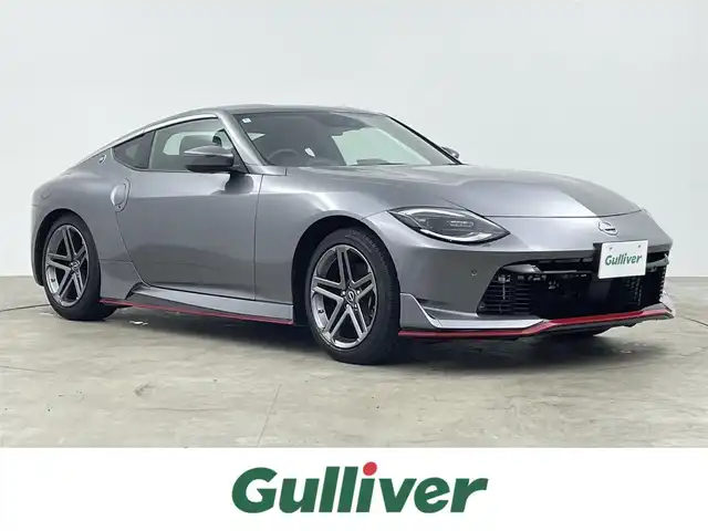 日産 フェアレディ Ｚ 千葉県 2024(令6)年 0.9万km ダークメタルグレー 6速MT/ワンオーナー/メーカーオプションナビ/・BT/TV/USB/AndroidAuto/バックカメラ/スポーツモード/ニスモエアロ/インテリジェントキー/スペアキー/プッシュスタートボタン/ビルトインETC2.0/革巻きステアリング/ステアリングスイッチ/Autoライト/レーダークルーズコントロール/オートマチックハイビーム/インテリジェントレーダーブレーキ/横滑り防止/LEDヘッドライト/フォグランプ/純正18インチアルミホイール/フロアマット/保証書/取扱説明書