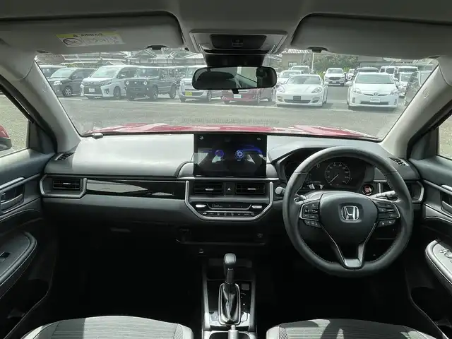 ホンダ ＷＲ－Ｖ Z+ 熊本県 2024(令6)年 0.9万km ワイン 社外ナビ/・AM/FM/USB/BT/・フルセグTV/ホンダセンシング/・衝突軽減ブレーキ/・踏み間違い衝突軽減システム/・路外逸脱抑制機能/・先行車発進お知らせ機能/・標識認識機能/・オートハイビーム/・アダプティブクルーズコントロール/・車線維持支援システム/ハーフレザーシート/革巻きステアリング/・ステアリングスイッチ/・パドルシフト/LEDヘッドライト/LEDフォグライト/純正フロアマット/オートライト/電動格納ミラー/ウインカーミラー/プッシュスタート/スマートキー