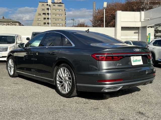アウディ Ａ８ 60TFSIクワトロ 東京都 2018(平30)年 12.2万km デイトナグレーパールエフェクト AUDIプレセンス/AUDIアクティブレーンアシスト/アダプティブクルーズコントロール/純正ナビ/フルセグTV/BT/USB/BANG＆OLUFSEN/全方位カメラ ETC2.0/サンルーフ レザーシート/前席シートヒーター/前席エアシート/前席パワーシート/LEDライト/オートライト/スマートキー×2/パドルシフト付革巻きハンドル/前ドライブレコーダー/前後コーナーセンサー/MMI タッチレスポンス/純正20インチアルミ