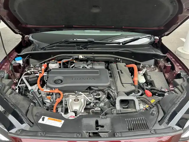 ホンダ ＺＲ－Ｖ ハイブリッド e:HEV Z 福島県 2023(令5)年 1.3万km ワイン 登録時走行距離：12375KM/4WD/純正ナビ/(フルセグTV/BT/AM/FM/USB)/パワーアウトレット/プッシュスタート/ビルトインETC2.0/左右独立エアコン/シートヒーター/（D席/P席）/ステアリングヒーター/パワーシート/（D席/P席）/メモリーシート/レザーシート/ISOFIX/パドルシフト/追従クルコン/ステアリングスイッチ/パワーバックドア/電動格納ミラー/ウィンカーミラー/純正AW/コーナーセンサー/純正LEDヘッドライト/横滑り防止装置/オートライト/アラウンドビューモニター/自動防眩インナーミラー/ボタン式シフトレバー/走行モード切替/（スポーツ/コンフォート/スノウ）/ヒルディセントコントロール/カーテンシールドエアバック/（F/R）