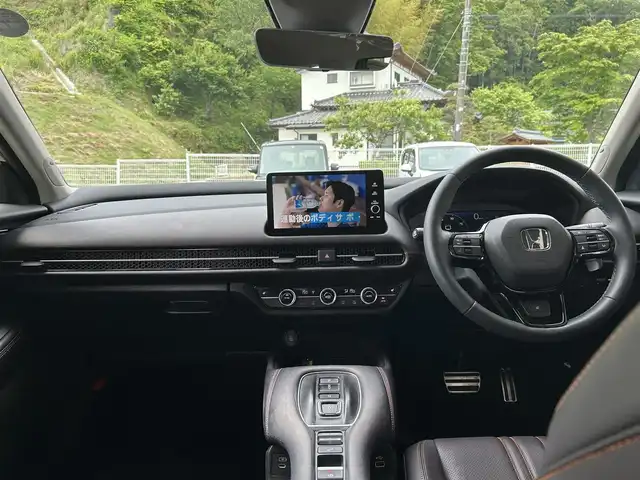 ホンダ ＺＲ－Ｖ ハイブリッド e:HEV Z 福島県 2023(令5)年 1.3万km ワイン 登録時走行距離：12375KM/4WD/純正ナビ/(フルセグTV/BT/AM/FM/USB)/パワーアウトレット/プッシュスタート/ビルトインETC2.0/左右独立エアコン/シートヒーター/（D席/P席）/ステアリングヒーター/パワーシート/（D席/P席）/メモリーシート/レザーシート/ISOFIX/パドルシフト/追従クルコン/ステアリングスイッチ/パワーバックドア/電動格納ミラー/ウィンカーミラー/純正AW/コーナーセンサー/純正LEDヘッドライト/横滑り防止装置/オートライト/アラウンドビューモニター/自動防眩インナーミラー/ボタン式シフトレバー/走行モード切替/（スポーツ/コンフォート/スノウ）/ヒルディセントコントロール/カーテンシールドエアバック/（F/R）