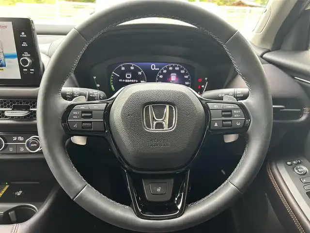 ホンダ ＺＲ－Ｖ ハイブリッド e:HEV Z 福島県 2023(令5)年 1.3万km ワイン 登録時走行距離：12375KM/4WD/純正ナビ/(フルセグTV/BT/AM/FM/USB)/パワーアウトレット/プッシュスタート/ビルトインETC2.0/左右独立エアコン/シートヒーター/（D席/P席）/ステアリングヒーター/パワーシート/（D席/P席）/メモリーシート/レザーシート/ISOFIX/パドルシフト/追従クルコン/ステアリングスイッチ/パワーバックドア/電動格納ミラー/ウィンカーミラー/純正AW/コーナーセンサー/純正LEDヘッドライト/横滑り防止装置/オートライト/アラウンドビューモニター/自動防眩インナーミラー/ボタン式シフトレバー/走行モード切替/（スポーツ/コンフォート/スノウ）/ヒルディセントコントロール/カーテンシールドエアバック/（F/R）