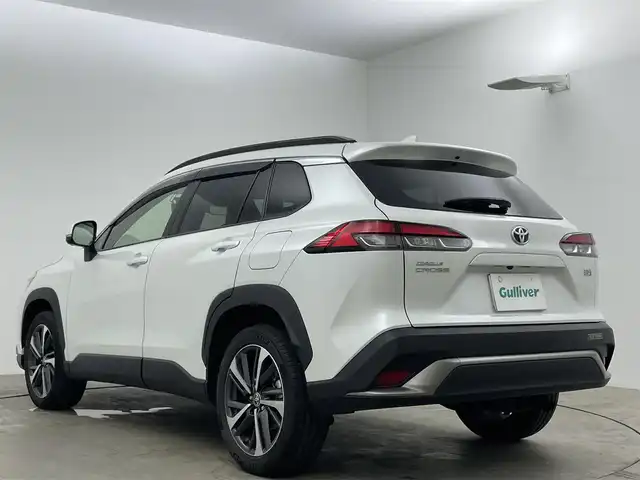 トヨタ カローラ クロス ハイブリッド Z 岡山県 2023(令5)年 3万km プラチナホワイトパールマイカ 純正9インチディスプレイオーディオ(ナビ機能付き)		/【フルセグ/Bluetooth/DVD】	/パノラマルーフ	/パノラミックビューモニター		/純正18inアルミホイール+サマータイヤ：装着			/レーダークルーズコントロール		/ビルトインETC		/LEDヘッドライト（AUTO機能付き）		/シートヒーター		/横滑り防止機能		/衝突軽減システム		/車線逸脱防止システム		/社外ドライブレコーダー			/スマートキー			/プッシュスタート		/コーナーセンサー				/新車保証書		/取扱説明書		/スペアキー×１