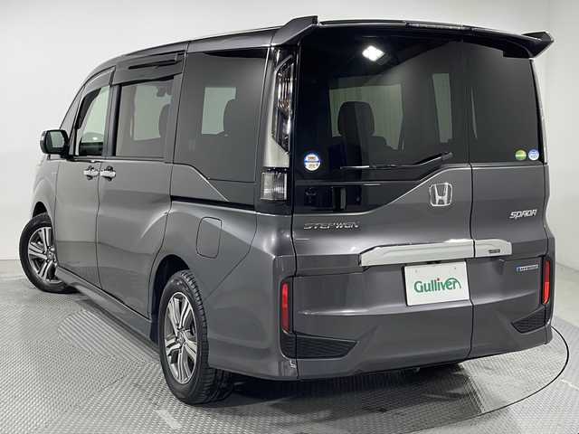 ホンダ ステップワゴン スパーダ ハイブリッド B ホンダセンシング 広島県 2018(平30)年 3.5万km モダンスティールM 禁煙車/純正ナビ(VXM-184Ci)/バックカメラ/両側パワースライドドア/レーダークルーズコントロール/電動パーキングブレーキ/ドラレコ/ＥＴＣ/コーナーセンサー/衝突軽減/レーンキープ/踏み間違い防止/ＬＥＤヘッドライト