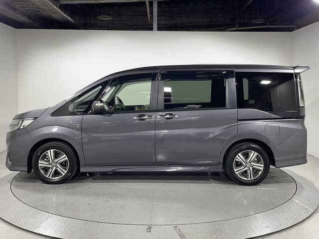ホンダ ステップワゴン スパーダ ハイブリッド B ホンダセンシング 広島県 2018(平30)年 3.5万km モダンスティールM 禁煙車/純正ナビ(VXM-184Ci)/バックカメラ/両側パワースライドドア/レーダークルーズコントロール/電動パーキングブレーキ/ドラレコ/ＥＴＣ/コーナーセンサー/衝突軽減/レーンキープ/踏み間違い防止/ＬＥＤヘッドライト