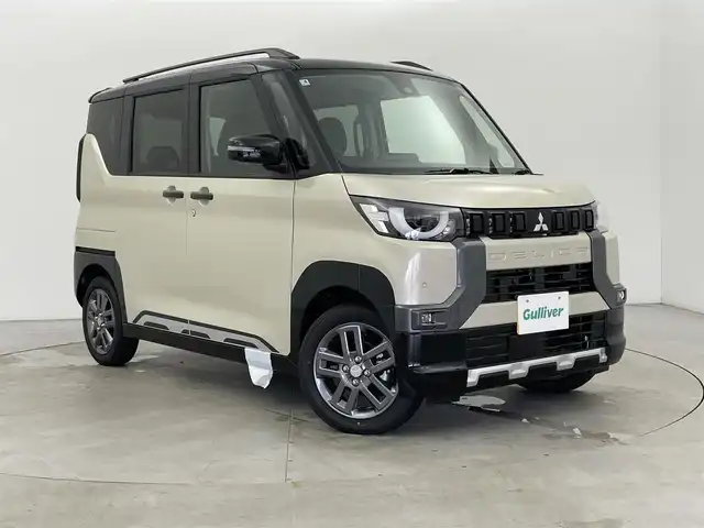三菱 デリカミニ T プレミアム 富山県 2025(令7)年 0.1万km未満 アイボリーⅡ 登録済未使用車/4WD/純正9型DA（AM/FM/USB/BT）/アラウンドビューモニター/両側パワースライドドア/衝突被害軽減ブレーキ/アダプティブクルーズコントロール/レーンキープアシスト/コーナーセンサー前後/オートマチックハイビーム/LEDヘッドライト/ハーフレザーシート/前席シートヒーター/ステアリングヒーター/デジタルインナーミラー/電動パーキングブレーキ/オートブレーキホールド/スマートキー×２/取扱説明書/保証書