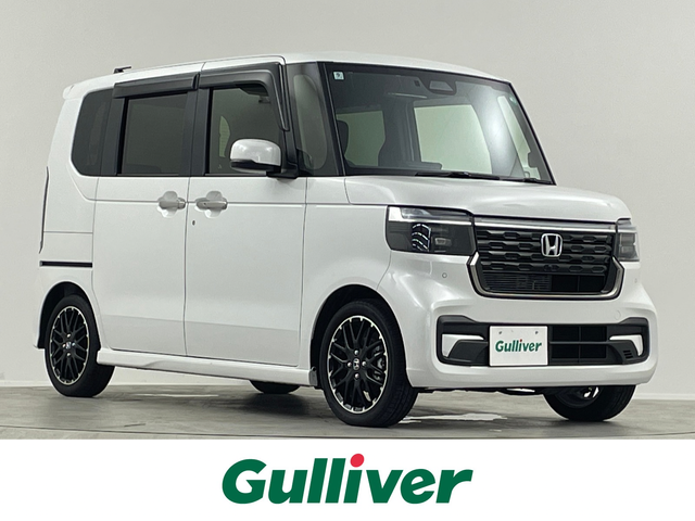 ホンダ Ｎ ＢＯＸ カスタム ターボ 福島県 2024(令6)年 0.5万km プラチナホワイトパール 純正９型ナビ　両側電動　衝突軽減　前席シートヒーター　フルセグＴＶ　バックカメラ　純フロアマット　１５インチＡＷ　レーンアシスト　追従クルコン　オートライト　純正マット