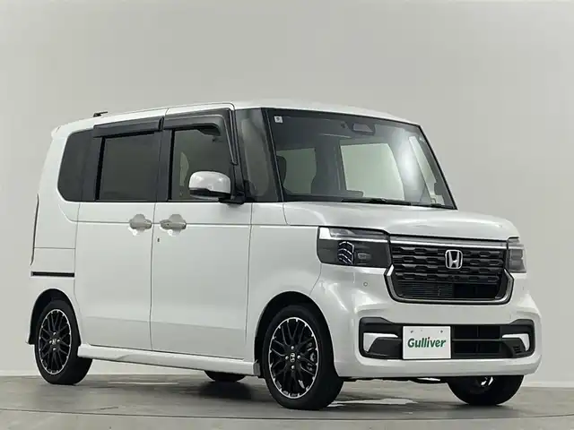ホンダ Ｎ ＢＯＸ カスタム ターボ 福島県 2024(令6)年 0.5万km プラチナホワイトパール 純正９型ナビ　両側電動　衝突軽減　前席シートヒーター　フルセグＴＶ　バックカメラ　純フロアマット　１５インチＡＷ　レーンアシスト　追従クルコン　オートライト　純正マット