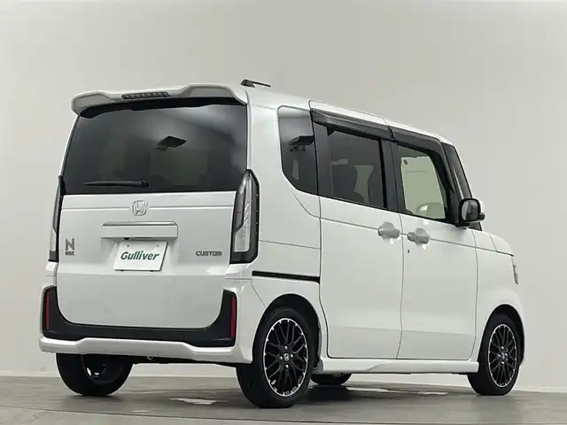 ホンダ Ｎ ＢＯＸ カスタム ターボ 福島県 2024(令6)年 0.5万km プラチナホワイトパール 純正９型ナビ　両側電動　衝突軽減　前席シートヒーター　フルセグＴＶ　バックカメラ　純フロアマット　１５インチＡＷ　レーンアシスト　追従クルコン　オートライト　純正マット