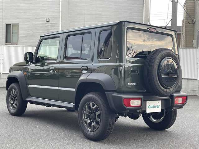 スズキ ジムニー ノマド FC 栃木県 2025(令7)年 0.1万km未満 緑 ・4WD/・ワンオーナー/・スズキセーフティサポート/・デュアルブレーキサポート/・誤発進抑制機能/・ふらつき警報機能/・標識認識機能/・先行車発進お知らせ機能/・レーダークルーズコントロール/・センターデフロック/・純正１５インチAW/・シートヒーター/・ダウンヒルアシストコントロール/・オートマチックハイビーム/・オートライト/・ヘッドライトウォッシャー/・LEDヘッドライト/・フォグランプ/・D/Nシートヒーター/・スマートキー/・アイドリングストップ/・ドアミラーヒーター/・横滑り防止/・取扱説明書/・保証書/・スペアキー１