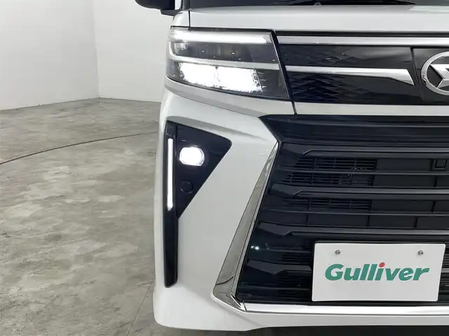 ダイハツ タント カスタム X 福島県 2023(令5)年 0.3万km シャイニングホワイトパール スマートアシスト　/・衝突被害軽減/・車線逸脱警報/・誤発信抑制機能/・オートハイビーム/バックカメラ　/ディスプレイオーディオ　/電子パーキング　/・ブレーキホールド　/レザーシート　/革巻きステアリング　/・チルトステアリング　/シートヒーター　/プッシュスタート　/・スマートキー/LEDライト/・オートライト/・フォグライト/純正フロアマット
