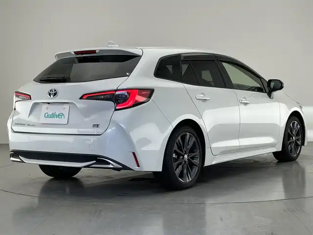 トヨタ カローラツーリング ハイブリッド ダブルバイビー 愛知県 2023(令5)年 3.9万km プラチナホワイトパールマイカ 純正１０．５型ナビ　BSM　追従クルコン　セーフティセンス　禁煙　フルセグ　黒ハーフレザー　Bluetooth　バックカメラ　車線逸脱　衝突軽減　ETC　USB　コーナーセンサー　LEDライト　フォグ　純正マット　ミラキャスト　電子パーキング　スマートキー　プッシュスタート