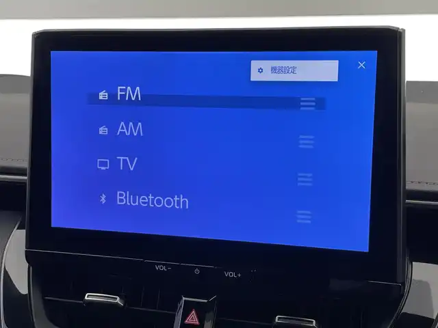 トヨタ カローラツーリング ハイブリッド ダブルバイビー 愛知県 2023(令5)年 3.9万km プラチナホワイトパールマイカ 純正１０．５型ナビ　BSM　追従クルコン　セーフティセンス　禁煙　フルセグ　黒ハーフレザー　Bluetooth　バックカメラ　車線逸脱　衝突軽減　ETC　USB　コーナーセンサー　LEDライト　フォグ　純正マット　ミラキャスト　電子パーキング　スマートキー　プッシュスタート