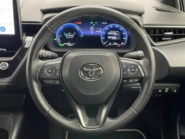 トヨタ カローラツーリング ハイブリッド ダブルバイビー 愛知県 2023(令5)年 3.9万km プラチナホワイトパールマイカ 純正１０．５型ナビ　BSM　追従クルコン　セーフティセンス　禁煙　フルセグ　黒ハーフレザー　Bluetooth　バックカメラ　車線逸脱　衝突軽減　ETC　USB　コーナーセンサー　LEDライト　フォグ　純正マット　ミラキャスト　電子パーキング　スマートキー　プッシュスタート