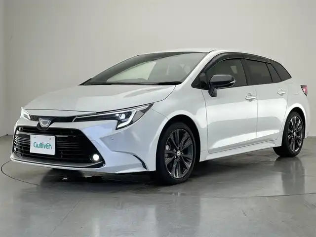 トヨタ カローラツーリング ハイブリッド ダブルバイビー 愛知県 2023(令5)年 3.9万km プラチナホワイトパールマイカ 純正１０．５型ナビ　BSM　追従クルコン　セーフティセンス　禁煙　フルセグ　黒ハーフレザー　Bluetooth　バックカメラ　車線逸脱　衝突軽減　ETC　USB　コーナーセンサー　LEDライト　フォグ　純正マット　ミラキャスト　電子パーキング　スマートキー　プッシュスタート