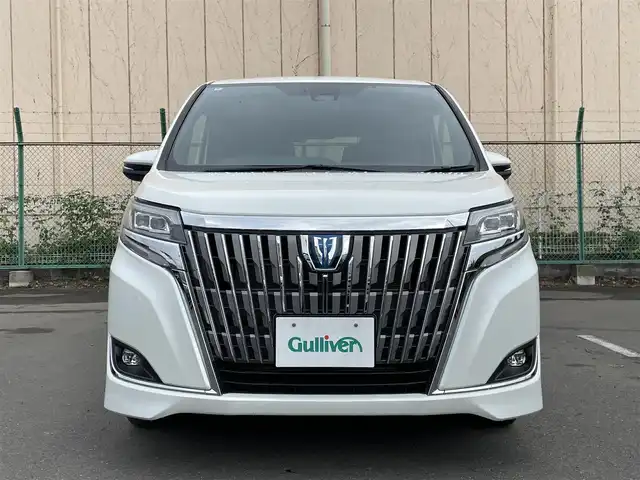 トヨタ エスクァイア ハイブリッド Gi 東京都 2018(平30)年 7.4万km ホワイトパールクリスタルシャイン 社外ナビ/バックモニター/プリクラッシュセーフティ/クリアランスソナー/レーンディパーチャーアラート/クルーズコントロール/オートマチックハイビーム/車両接近通報装置/シートヒーター/両側電動ドア/ETC