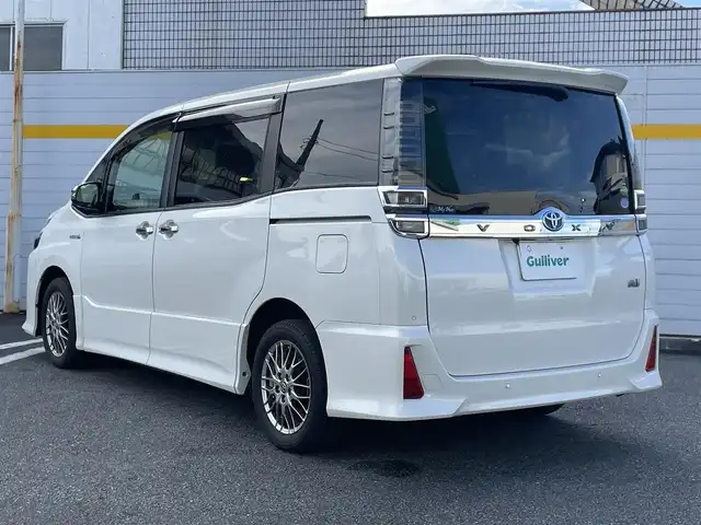 トヨタ ヴォクシー ハイブリッド ZS 煌Ⅱ 埼玉県 2019(平31)年 4.3万km ホワイトパールクリスタルシャイン ・純正ナビ/・純正フリップダウンモニター/・トヨタセーフティセンス/・レザー調シートカバー/・シートヒーター/・クルーズコントロール/・ドライブレコーダー/・コーナーセンサー/・バックカメラ