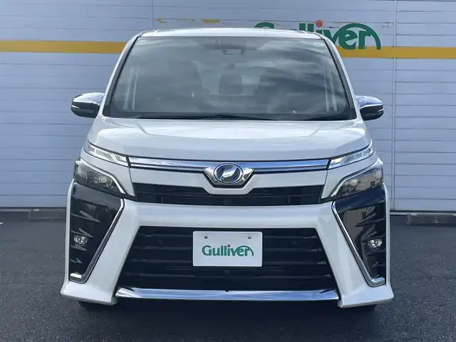 トヨタ ヴォクシー ハイブリッド ZS 煌Ⅱ 埼玉県 2019(平31)年 4.3万km ホワイトパールクリスタルシャイン ・純正ナビ/・純正フリップダウンモニター/・トヨタセーフティセンス/・レザー調シートカバー/・シートヒーター/・クルーズコントロール/・ドライブレコーダー/・コーナーセンサー/・バックカメラ
