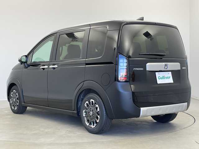 ホンダ フリード ハイブリット e:HEV クロスター 新潟県 2025(令7)年 0.1千km クリスタルブラックパール ホンダセンシング/9インチナビ（BT/CarPlay/AndroidAuto）/バックカメラ/両側パワースライドドア/シートヒーター/オートエアコン/オートライト/オートマチックハイビーム/衝突軽減システム/スマートキー/プッシュスタート/スペアキー/LEDヘッドライト/カーテンエアバック/ブラインドスポットモニター/レーンキープアシスト/保証書/取説/レザーステアリング/ステアリングスイッチ