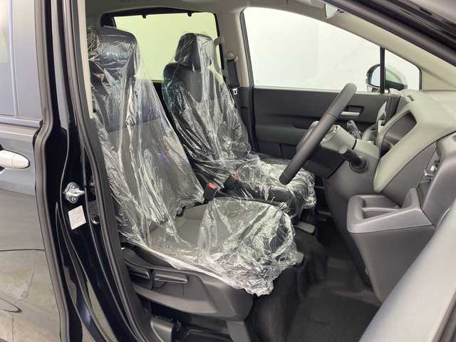 ホンダ フリード ハイブリット e:HEV クロスター 新潟県 2025(令7)年 0.1千km クリスタルブラックパール ホンダセンシング/9インチナビ（BT/CarPlay/AndroidAuto）/バックカメラ/両側パワースライドドア/シートヒーター/オートエアコン/オートライト/オートマチックハイビーム/衝突軽減システム/スマートキー/プッシュスタート/スペアキー/LEDヘッドライト/カーテンエアバック/ブラインドスポットモニター/レーンキープアシスト/保証書/取説/レザーステアリング/ステアリングスイッチ