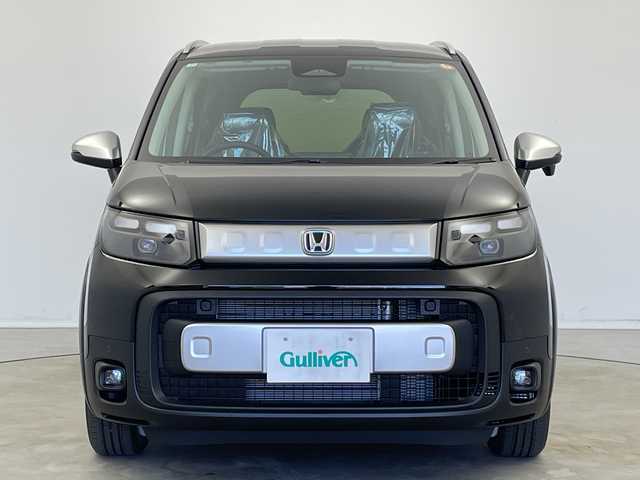 ホンダ フリード ハイブリット e:HEV クロスター 新潟県 2025(令7)年 0.1千km クリスタルブラックパール ホンダセンシング/9インチナビ（BT/CarPlay/AndroidAuto）/バックカメラ/両側パワースライドドア/シートヒーター/オートエアコン/オートライト/オートマチックハイビーム/衝突軽減システム/スマートキー/プッシュスタート/スペアキー/LEDヘッドライト/カーテンエアバック/ブラインドスポットモニター/レーンキープアシスト/保証書/取説/レザーステアリング/ステアリングスイッチ