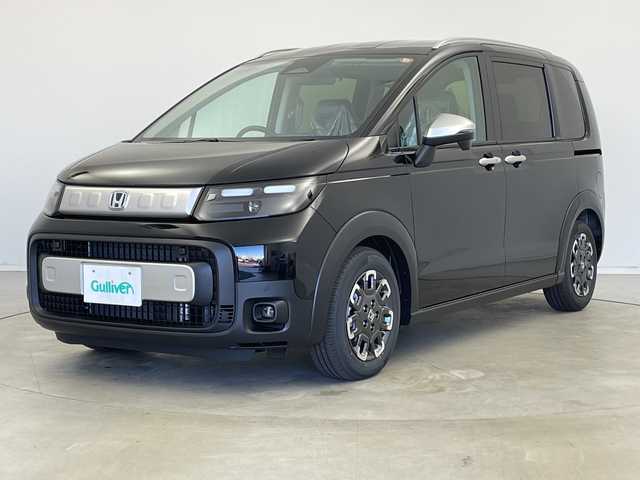 ホンダ フリード ハイブリット e:HEV クロスター 新潟県 2025(令7)年 0.1千km クリスタルブラックパール ホンダセンシング/9インチナビ（BT/CarPlay/AndroidAuto）/バックカメラ/両側パワースライドドア/シートヒーター/オートエアコン/オートライト/オートマチックハイビーム/衝突軽減システム/スマートキー/プッシュスタート/スペアキー/LEDヘッドライト/カーテンエアバック/ブラインドスポットモニター/レーンキープアシスト/保証書/取説/レザーステアリング/ステアリングスイッチ