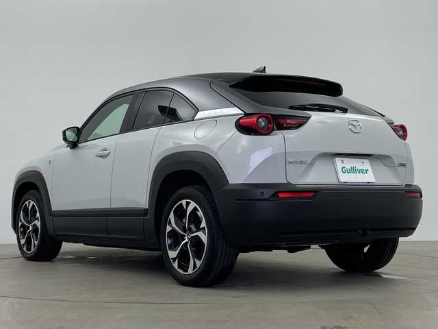 マツダ ＭＸ－３０ロータリーＥＶ ナチュラルモノトーン 鹿児島県 2023(令5)年 0.3万km セラミックメタリック 純正マツダコネクトナビ/(BT/FM/AM/フルセグTV)/全方位カメラ/バックカメラ/オートマチックハイビーム/パドルシフト/電動パーキングブレーキ/オートホールド/ブラインドスポットモニター/シティブレーキアシスト/レーダークルーズコントロール/BOSEサウンドシステム/メモリ付パワーシート/シートヒーター/ステアリングヒーター