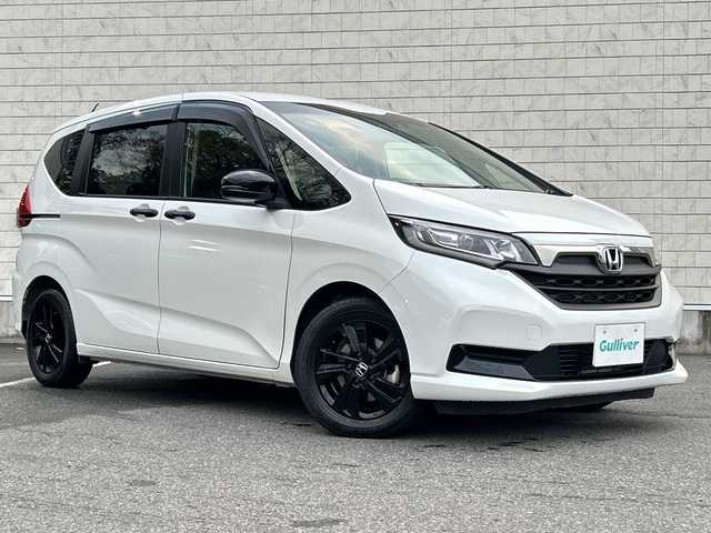 ホンダ フリード ハイブリット G ブラックスタイル 大阪府 2022(令4)年 1.7万km プラチナホワイトパール ９インチナビ　/フルセグ　/Ｂｌｕｅｔｏｏｔｈ　/バックカメラ　/両側パワースライドドア　/シートヒーター　/レーダークルーズコントロール　/前後ドライブレコーダー　/ＥＴＣ　/フロアーマット　/サイドバイザー