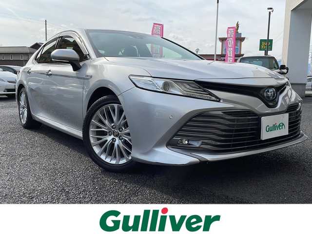 トヨタ カムリ G レザーパッケージ 山形県 2020(令2)年 6.2万km シルバーM ・ワンオーナー/・４WD/・レザーシート/・9インチディスプレイオーディオ/フルセグ/BT/ミラキャスト/AMFM/・バックカメラ/・純正前方ドラレコ/・ビルトインETC/・MTモード付きAT/・衝突被害軽減システム/・レーンキープアシスト/・前後クリアランスソナー/・ブラインドスポットモニター/・LEDヘッドランプ/・オートライト（オートマチックハイビーム）/・LEDフォグランプ/・リアフォグランプ/・レーダークルーズコントロール/・ヘッドアップディスプレイ/・ステアリングスイッチ/・前席パワーシート、シートヒーター/・純正AW/・純正マット/・スタッドレスタイヤ＋社外AW積込/・保証書/・取扱説明書