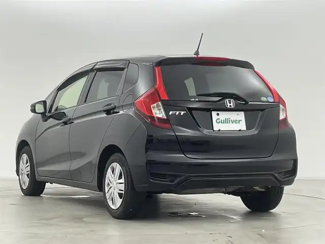 ホンダ フィット 13G L ホンダセンシング 群馬県 2019(令1)年 4.2万km クリスタルブラックパール 社外ナビ(CN-RE05D)/AM/FM/CD/DVD/BT/フルセグ/バックカメラ/ETC/ホンダセンシング/・衝突軽減ブレーキ〈CMBS〉/・誤発進抑制機能/・歩行者事故低減ステアリング/・路外逸脱抑制機能/・ACC〈アダプティブ・クルーズ・コントロー〉/・LKAS〈車線維持支援システム〉/・先行車発進お知らせ機能/・標識認識機能/アイドリングストップ/LEDヘッドライト/175/70R14 アルミホイール付きスタッドレスタイヤ4本車載/スマートキー/プッシュスタート