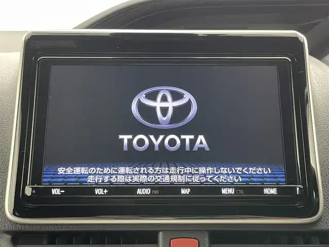 トヨタ エスクァイア ハイブリッド Gi 岡山県 2020(令2)年 7万km ボルドーマイカメタリック 純正9インチメモリナビゲーション		/【フルセグ/Bluetooth/DVD/MSV】/１２．１インチフリップダウンモニター/モデリスタエアロ		/バックカメラ		/純正15inアルミホイール+サマータイヤ：装着		/クルーズコントロール		/ビルトインETC		/LEDヘッドライト（AUTO機能付き）		/シートヒーター		/横滑り防止機能		/衝突軽減システム		/車線逸脱防止システム		/社外ドライブレコーダー				/プッシュスタート		/コーナーセンサー				/純正フロアマット		/新車保証書		/取扱説明書		/スペアキー×１