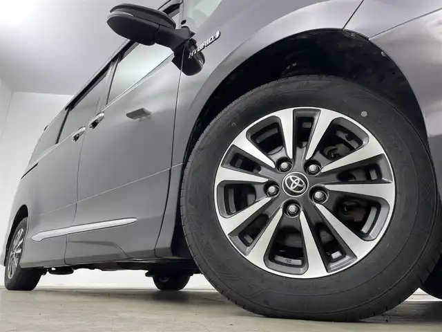 トヨタ エスクァイア ハイブリッド Gi 岡山県 2020(令2)年 7万km ボルドーマイカメタリック 純正9インチメモリナビゲーション		/【フルセグ/Bluetooth/DVD/MSV】/１２．１インチフリップダウンモニター/モデリスタエアロ		/バックカメラ		/純正15inアルミホイール+サマータイヤ：装着		/クルーズコントロール		/ビルトインETC		/LEDヘッドライト（AUTO機能付き）		/シートヒーター		/横滑り防止機能		/衝突軽減システム		/車線逸脱防止システム		/社外ドライブレコーダー				/プッシュスタート		/コーナーセンサー				/純正フロアマット		/新車保証書		/取扱説明書		/スペアキー×１
