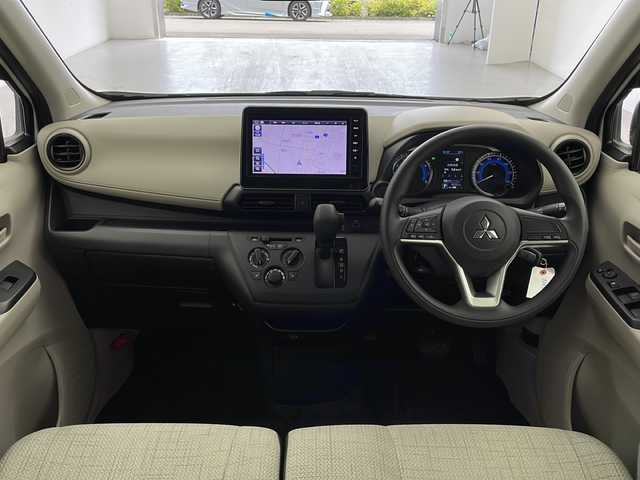 三菱 ｅＫワゴン M 宮城県 2023(令5)年 0.7万km シルキーホワイト ４WD/禁煙車/純正9インチナビ：MM22D-LM/（TV/ナビ/Bluetooth/AM/FM/VTR/HDMI）/バックカメラ/シートヒーター（運転席/助手席）/純正フロアマット/レーンキープアシスト/ステアリングリモコン/コーナーセンサー/ETC/USBポート