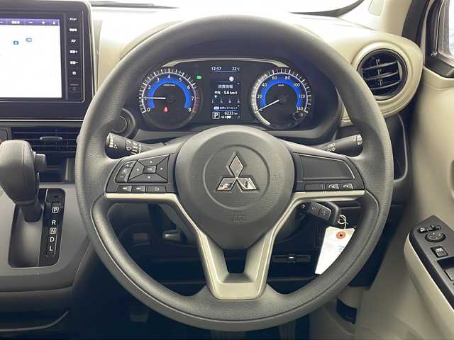 三菱 ｅＫワゴン M 宮城県 2023(令5)年 0.7万km シルキーホワイト ４WD/禁煙車/純正9インチナビ：MM22D-LM/（TV/ナビ/Bluetooth/AM/FM/VTR/HDMI）/バックカメラ/シートヒーター（運転席/助手席）/純正フロアマット/レーンキープアシスト/ステアリングリモコン/コーナーセンサー/ETC/USBポート