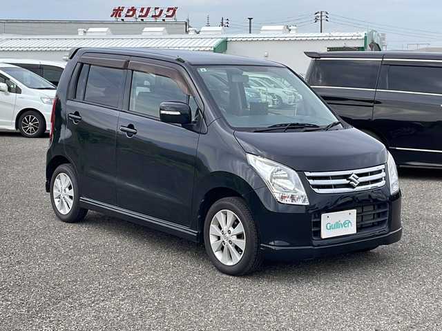 スズキ ワゴンＲ FX－LTDⅡ 新潟県 2009(平21)年 2万km ブルーイッシュブラックパール3 4WD/社外ポータブルナビ/CD/フルセグテレビ/ベンチシート/運転席シートヒーター/ミラーヒーター/スマートキー/プッシュスタート/純正14インチアルミホイール