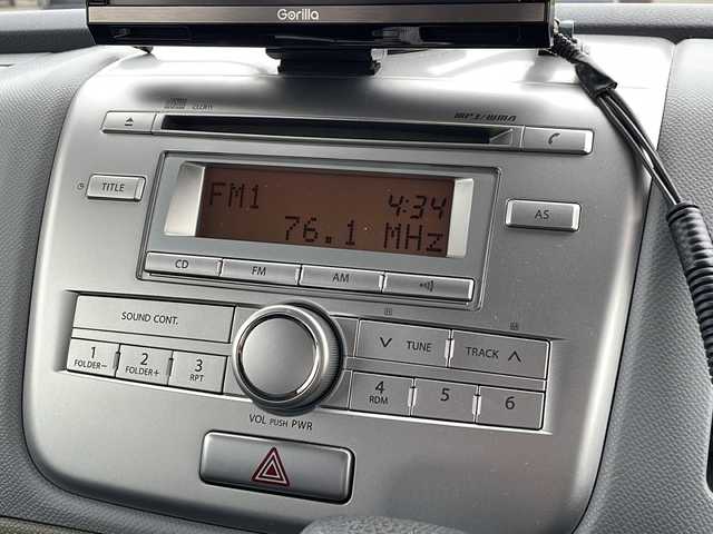 スズキ ワゴンＲ FX－LTDⅡ 新潟県 2009(平21)年 2万km ブルーイッシュブラックパール3 4WD/社外ポータブルナビ/CD/フルセグテレビ/ベンチシート/運転席シートヒーター/ミラーヒーター/スマートキー/プッシュスタート/純正14インチアルミホイール
