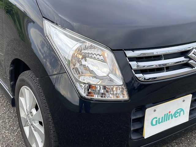 スズキ ワゴンＲ FX－LTDⅡ 新潟県 2009(平21)年 2万km ブルーイッシュブラックパール3 4WD/社外ポータブルナビ/CD/フルセグテレビ/ベンチシート/運転席シートヒーター/ミラーヒーター/スマートキー/プッシュスタート/純正14インチアルミホイール