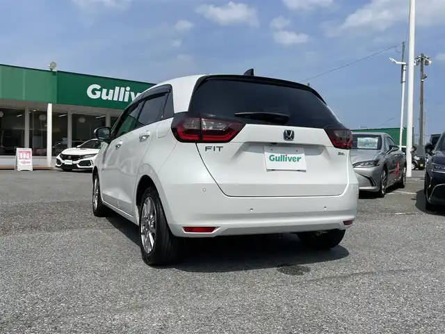 ホンダ フィット e:HEVホーム 千葉県 2020(令2)年 2.6万km プラチナホワイトパール ホンダセンシング/・衝突軽減ブレーキ/・レーンキープアシスト/・踏み間違え衝突軽減/・標識認識機能/・アダプティブクルーズコントロール/純正9インチSDナビ【VXU-205FTi】/・CD/DVD/MSV/Bluetooth/フルセグ/バックカメラ/スマートキー/前後コーナーセンサー/ハーフレザーシート/純正LEDヘッドライト/ブレーキオートホールド/社外15インチアルミホイール/ETC/本革巻きステアリング/ドアバイザー/新車時保証書＆取扱説明書