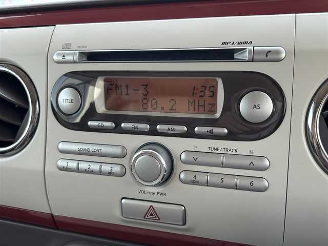 スズキ ラパン ショコラ X 鳥取県 2015(平27)年 6.6万km シャンパンピンクPM 純正ＣＤオーディオ/専用レザーシート/専用革巻きハンドル/キセノンライト/プッシュスタート/純正アルミホイール/プッシュスタート/アイドリングストップ/ウィンカーミラー/電動格納ミラー/オートライト/ドアバイザー/フロアマット
