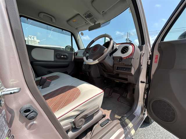 スズキ ラパン ショコラ X 鳥取県 2015(平27)年 6.6万km シャンパンピンクPM 純正ＣＤオーディオ/専用レザーシート/専用革巻きハンドル/キセノンライト/プッシュスタート/純正アルミホイール/プッシュスタート/アイドリングストップ/ウィンカーミラー/電動格納ミラー/オートライト/ドアバイザー/フロアマット