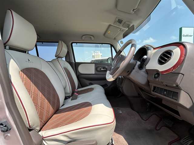 スズキ ラパン ショコラ X 鳥取県 2015(平27)年 6.6万km シャンパンピンクPM 純正ＣＤオーディオ/専用レザーシート/専用革巻きハンドル/キセノンライト/プッシュスタート/純正アルミホイール/プッシュスタート/アイドリングストップ/ウィンカーミラー/電動格納ミラー/オートライト/ドアバイザー/フロアマット