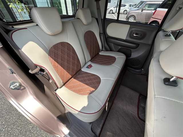 スズキ ラパン ショコラ X 鳥取県 2015(平27)年 6.6万km シャンパンピンクPM 純正ＣＤオーディオ/専用レザーシート/専用革巻きハンドル/キセノンライト/プッシュスタート/純正アルミホイール/プッシュスタート/アイドリングストップ/ウィンカーミラー/電動格納ミラー/オートライト/ドアバイザー/フロアマット