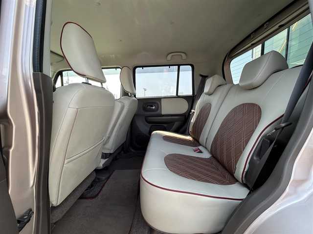 スズキ ラパン ショコラ X 鳥取県 2015(平27)年 6.6万km シャンパンピンクPM 純正ＣＤオーディオ/専用レザーシート/専用革巻きハンドル/キセノンライト/プッシュスタート/純正アルミホイール/プッシュスタート/アイドリングストップ/ウィンカーミラー/電動格納ミラー/オートライト/ドアバイザー/フロアマット