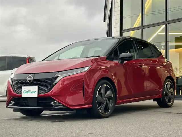 日産 オーラ G レザーエディション 愛媛県 2022(令4)年 1.9万km ガーネットレッド/スーパーブラック 2トーン 純正9型NissanConnectナビ/BOSEパーソナルプラスサウンドシステム/全周囲カメラ/プロパイロット/純正ドライブレコーダー/インテリジェントルームミラー/ブラインドスポットモニター/ワイヤレス充電/クリアランスソナー/電動パーキングブレーキ/AutoHold/電格ミラー/ステアリングリモコン/ISOFIX/現状サマー(純正AW)(205/50/R17)/BRIDGESTONE TURANZA T005A