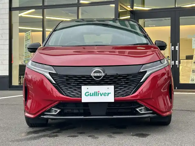 日産 オーラ G レザーエディション 愛媛県 2022(令4)年 1.9万km ガーネットレッド/スーパーブラック 2トーン 純正9型NissanConnectナビ/BOSEパーソナルプラスサウンドシステム/全周囲カメラ/プロパイロット/純正ドライブレコーダー/インテリジェントルームミラー/ブラインドスポットモニター/ワイヤレス充電/クリアランスソナー/電動パーキングブレーキ/AutoHold/電格ミラー/ステアリングリモコン/ISOFIX/現状サマー(純正AW)(205/50/R17)/BRIDGESTONE TURANZA T005A