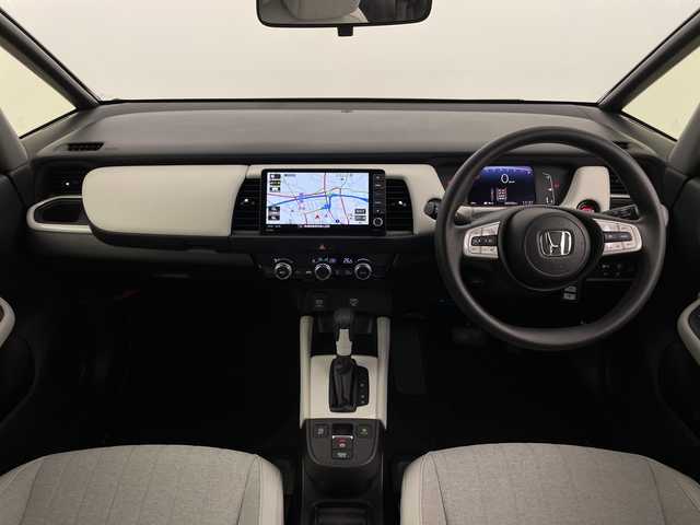 ホンダ フィット ホーム 新潟県 2021(令3)年 6.4万km プレミアムクリスタルレッドM ワンオーナー/4WD/スマートキー/スペアキー1本/9インチナビ　型式VXU-205FTi/ドライブレコーダー前後/フルセグ/CD/DVD/USB/バックカメラ/ハーフレザー/コーナーセンサー/ホンダセンシング/新車時保証書/取扱説明書